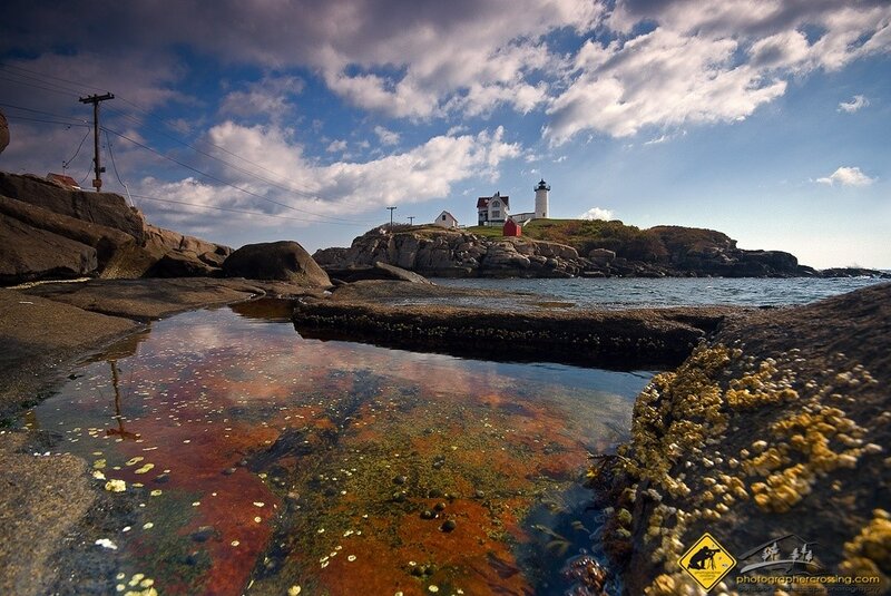 lighthouse on rocky coast