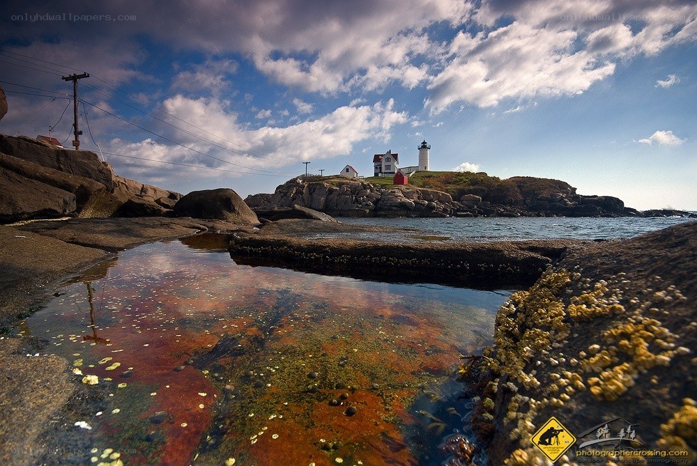lighthouse on rocky coast