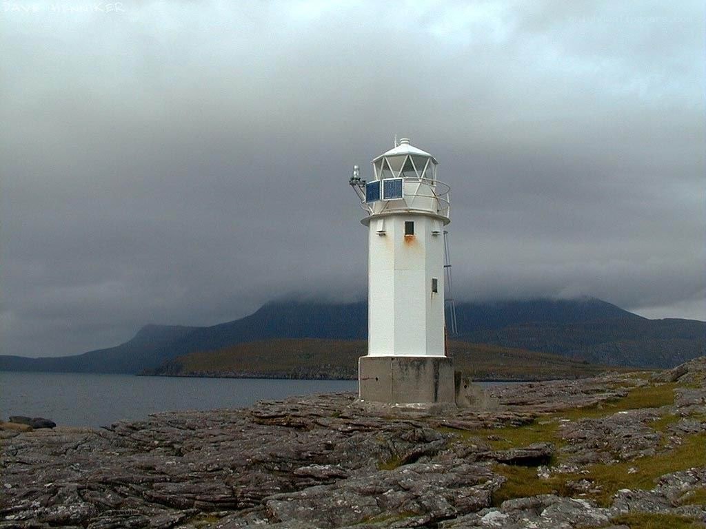 lighthouse on rocky coast