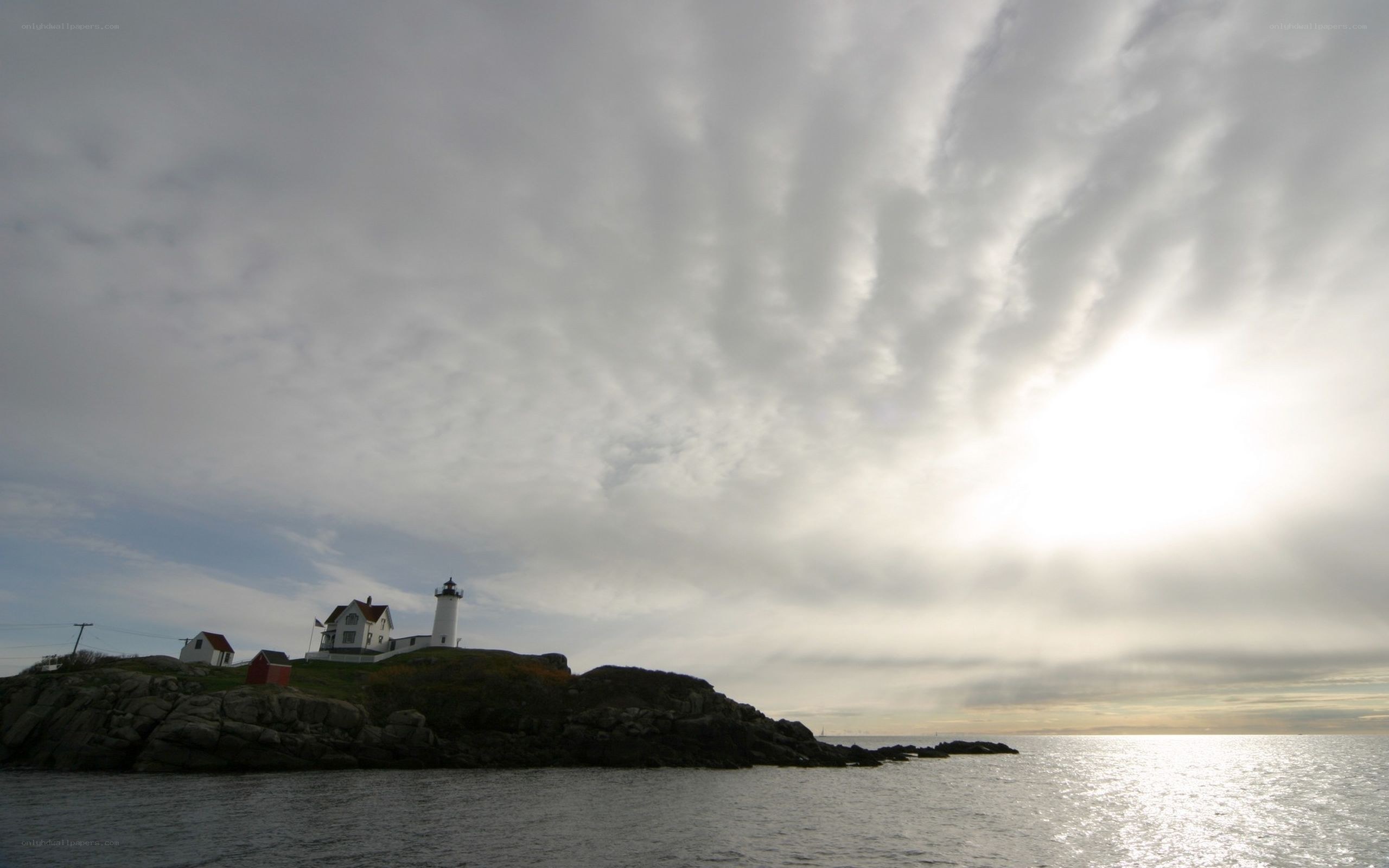 lighthouse on rocky coast