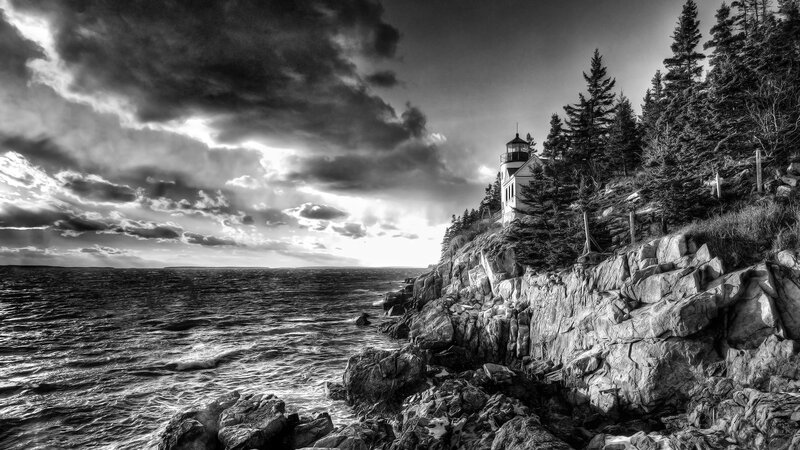 Lighthouse on Rocky Coast — Black, Dramatic