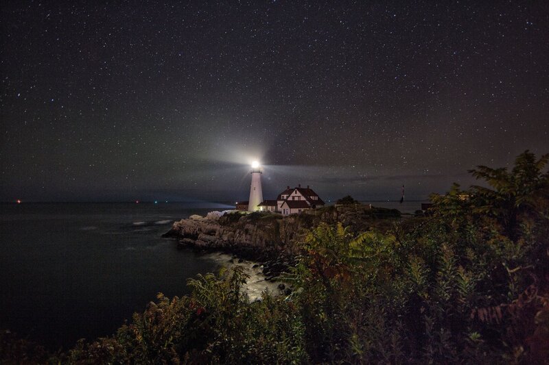 Lighthouse on Rocky Coast — Black, Serene