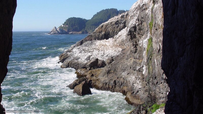 Lighthouse on Rocky Coast — Blue, Dramatic, Afternoon, Photograph, Ocean, Cliffs, Trees
