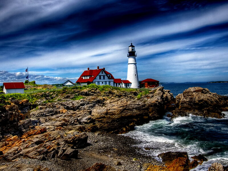 Lighthouse on Rocky Coast — Blue, Dramatic, Afternoon, Photograph, Ocean, Rocks