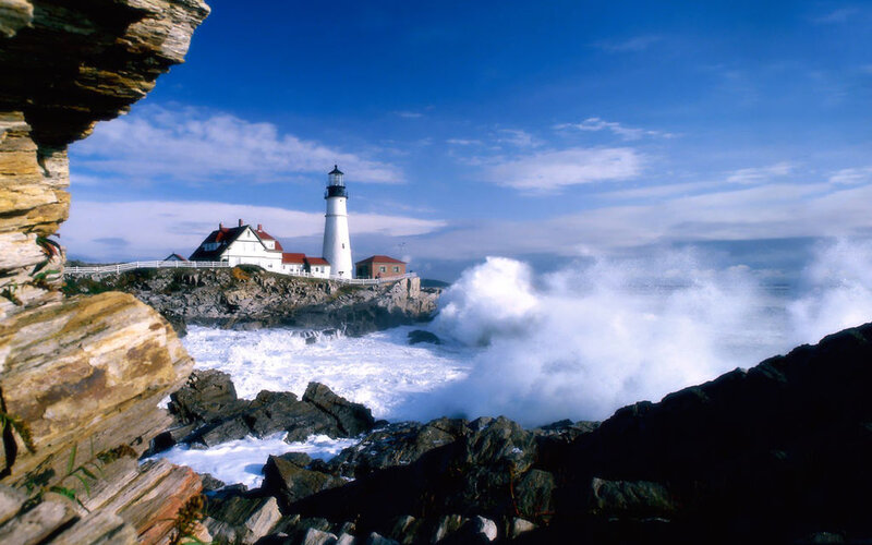 Lighthouse on Rocky Coast — Blue, Dramatic, Afternoon, Photograph, Ocean Waves