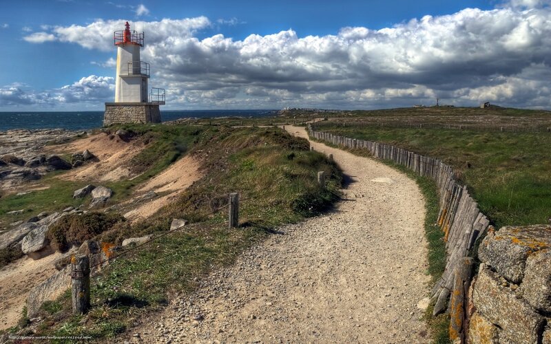 Lighthouse on Rocky Coast — Blue, Dramatic, Afternoon, Photograph, Path