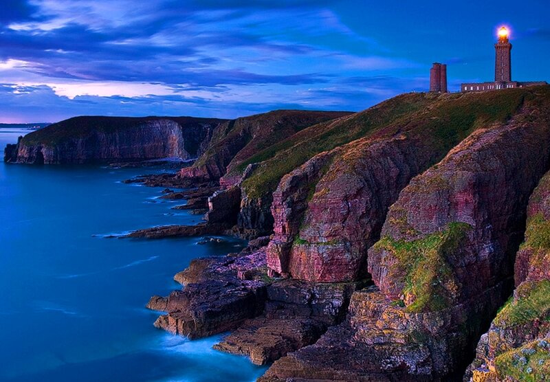 Lighthouse on Rocky Coast — Blue, Dramatic, Night, Photograph, Cliffs, Ocean