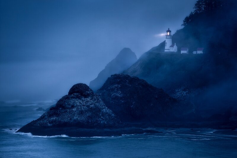 Lighthouse on Rocky Coast — Blue, Dramatic, Night, Photograph, Coastline