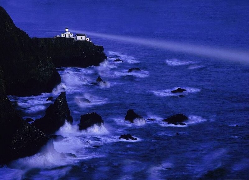 Lighthouse on Rocky Coast — Blue, Dramatic, Night