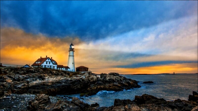 Lighthouse on Rocky Coast — Blue, Dramatic, Sunset, Photograph, House, Ocean