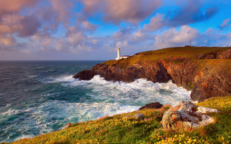 Lighthouse on Rocky Coast — Blue, Dramatic, Sunset, Photograph, Ocean, Cliffs
