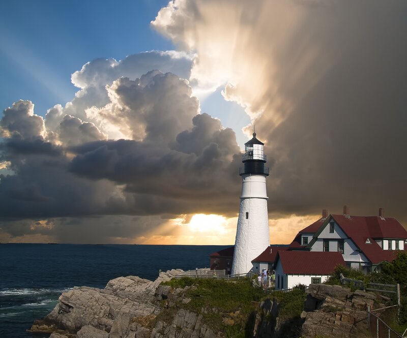 Lighthouse on Rocky Coast — Blue, Dramatic, Sunset, Photograph, Ocean, Clouds