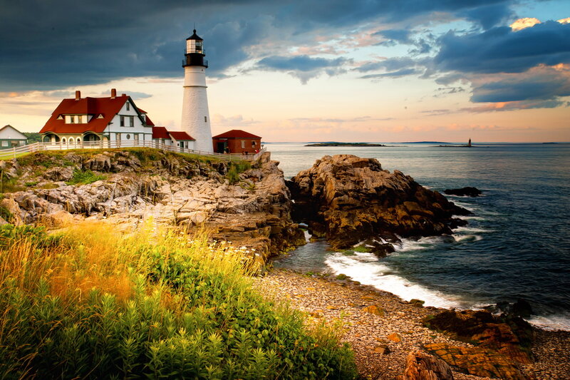 Lighthouse on Rocky Coast — Blue, Dramatic, Sunset, Photograph, Ocean, Rocks, Sky