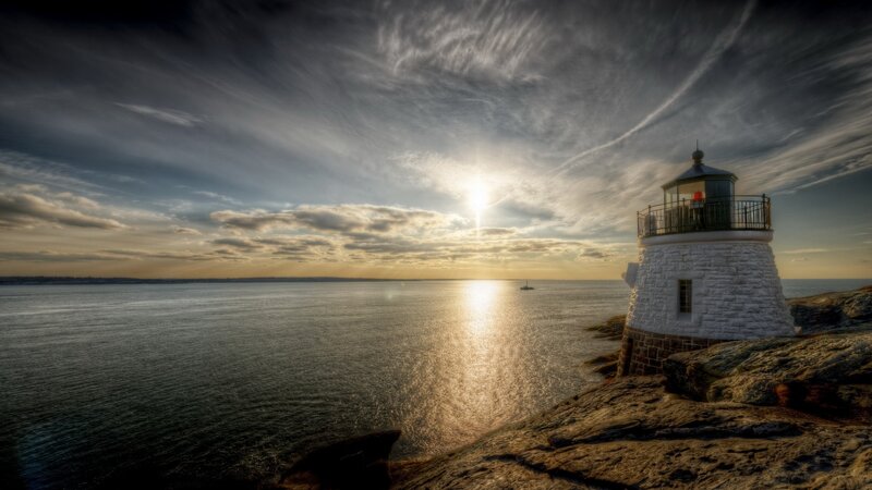 Lighthouse on Rocky Coast — Blue, Dramatic, Sunset, Photograph, Ocean, Sun