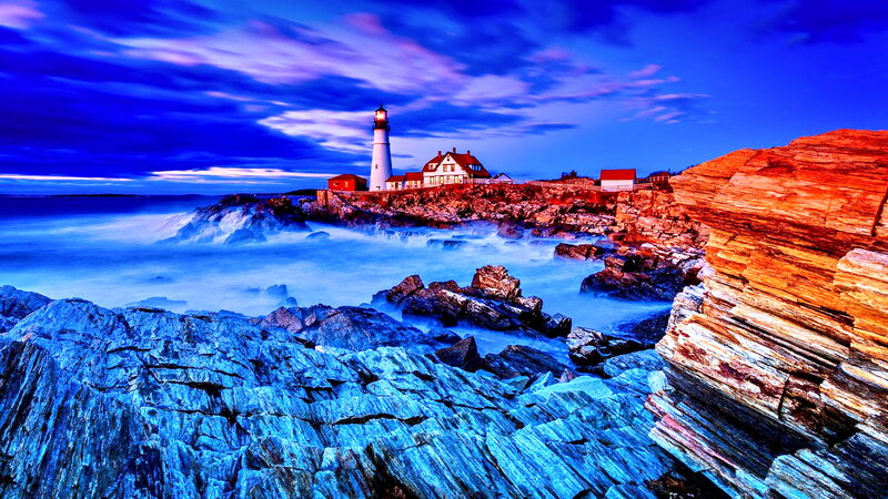 Lighthouse on Rocky Coast — Blue, Dramatic, Sunset, Photograph, Rocks, Ocean, Sky