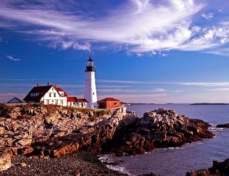 Lighthouse on Rocky Coast — Blue, Serene, Afternoon, Photograph, Buildings