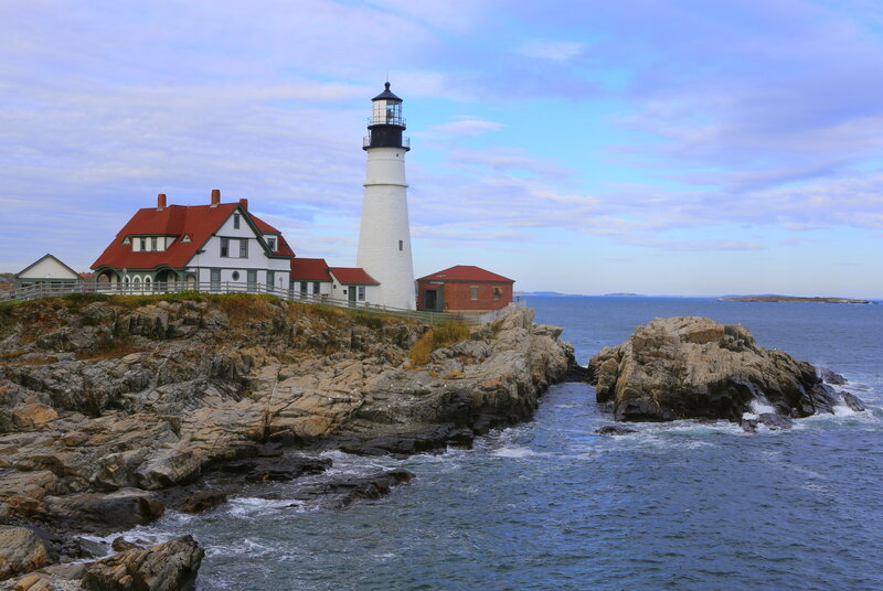 Lighthouse on Rocky Coast — Blue, Serene, Afternoon, Photograph, House, Ocean, Rocks