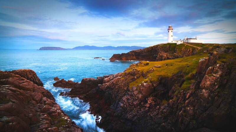 Lighthouse on Rocky Coast — Blue, Serene, Afternoon, Photograph, Ocean, Cliffs, Island
