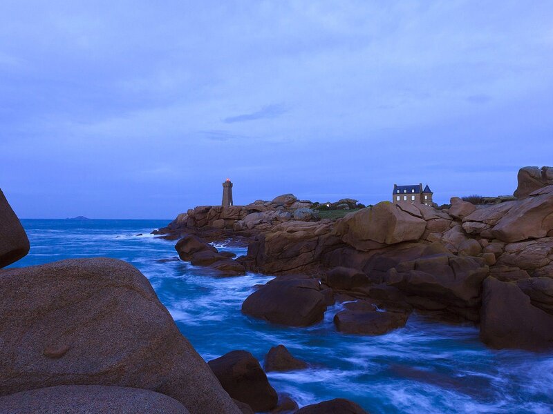 Lighthouse on Rocky Coast — Blue, Serene, Night, Photograph, Ocean, Rocks