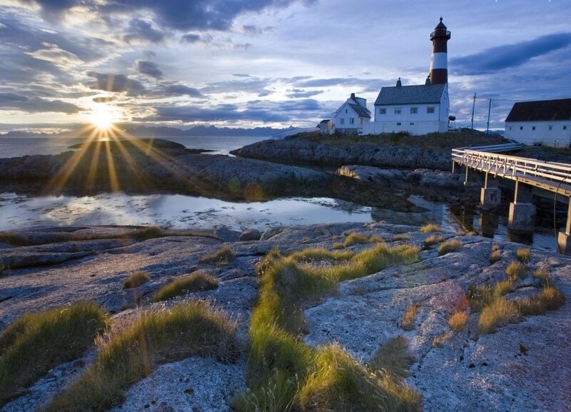 Lighthouse on Rocky Coast — Blue, Serene, Sunrise