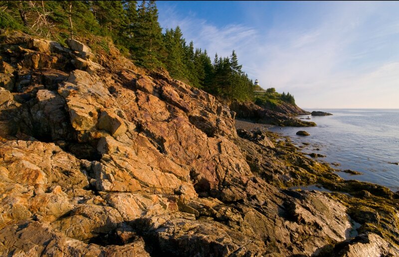 Lighthouse on Rocky Coast — Brown