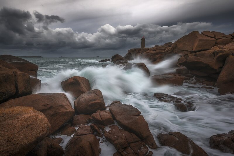 Lighthouse on Rocky Coast — Gray, Dramatic, Photograph, Ocean Waves