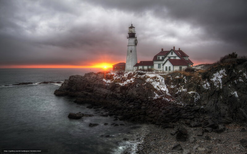 Lighthouse on Rocky Coast — Gray, Dramatic, Sunrise, Photograph