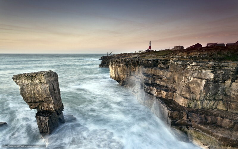 Lighthouse on Rocky Coast — Gray, Dramatic, Sunset, Photograph, Cliffs