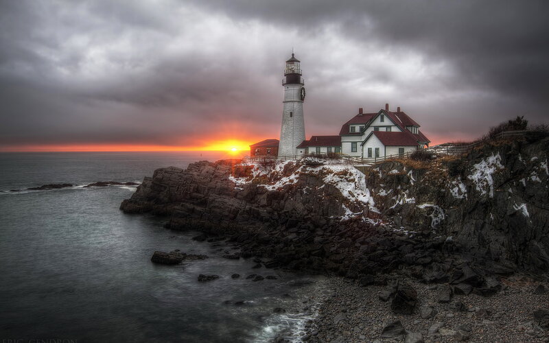 Lighthouse on Rocky Coast — Gray, Dramatic, Sunset, Photograph, Ocean