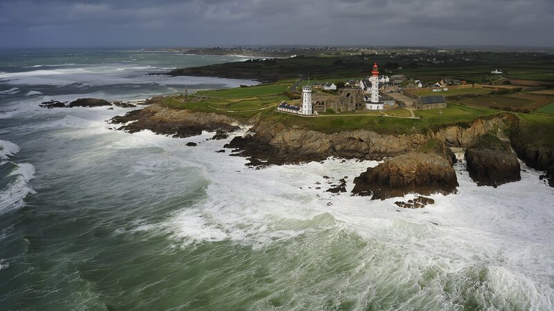 Lighthouse on Rocky Coast — Green, Dramatic, Photograph