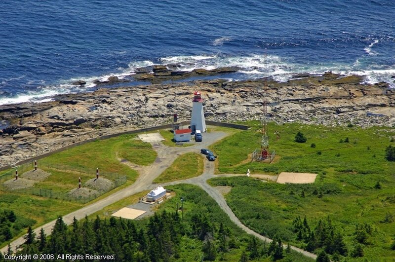 Lighthouse on Rocky Coast — Green