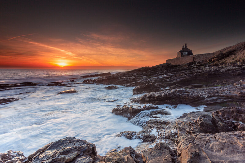 Lighthouse on Rocky Coast — Orange, Dramatic, Sunrise