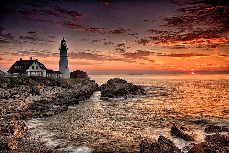 Lighthouse on Rocky Coast — Orange, Dramatic, Sunset, Photograph, Ocean, Sky