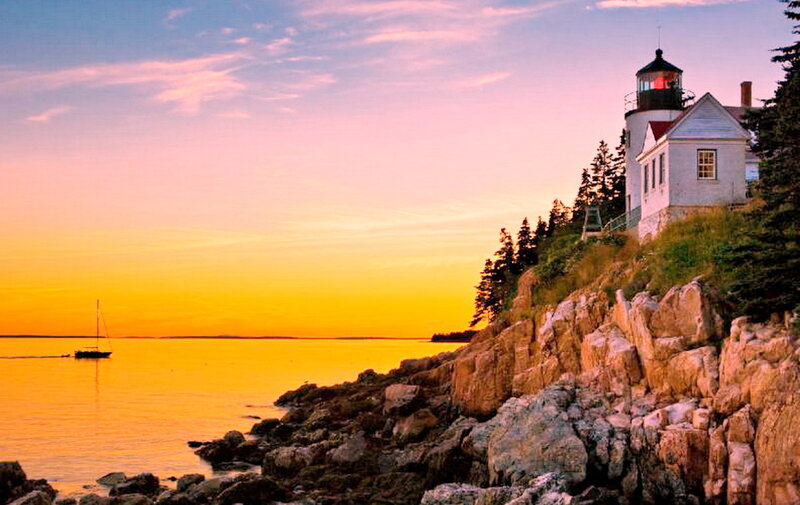 Lighthouse on Rocky Coast — Orange