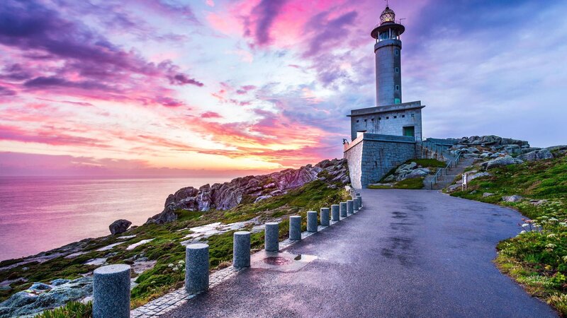 Lighthouse on Rocky Coast — Pink, Dramatic, Sunset, Photograph, Ocean