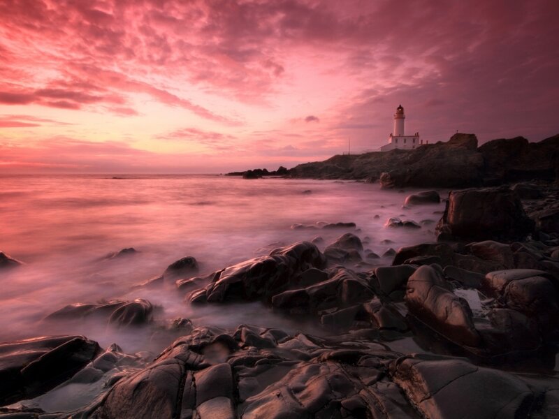Lighthouse on Rocky Coast — Pink, Dramatic