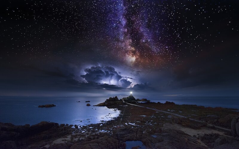 Lighthouse on Rocky Coast — Purple, Dramatic, Night, Photograph