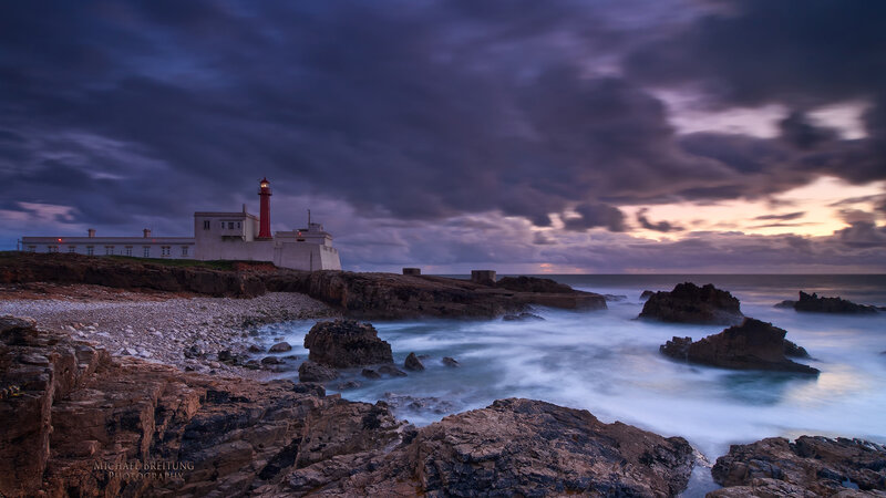 Lighthouse on Rocky Coast — Purple, Dramatic, Sunset, Photograph, Ocean