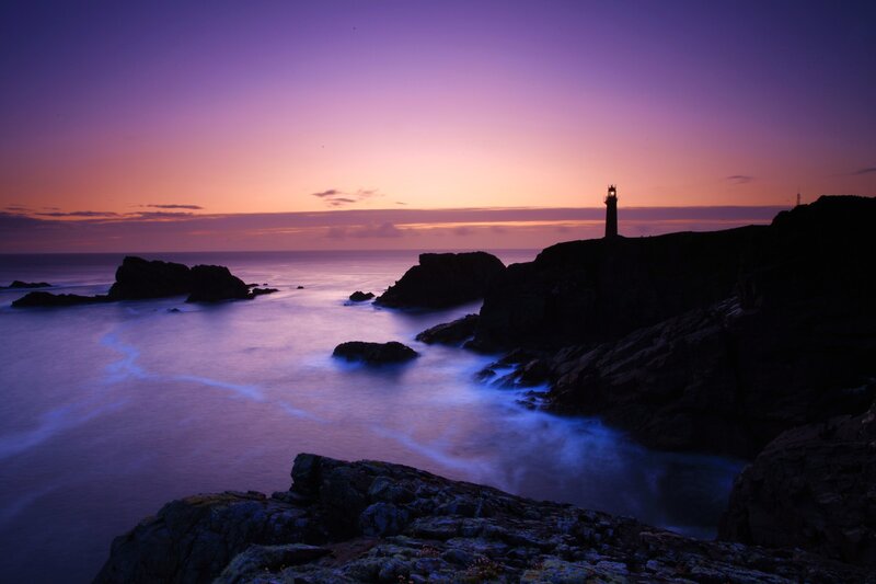 Lighthouse on Rocky Coast — Purple, Serene