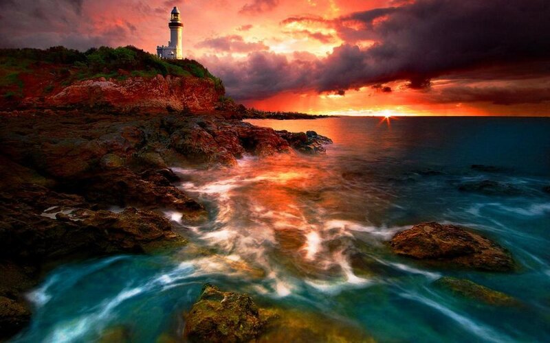 Lighthouse on Rocky Coast — Red, Dramatic, Sunset