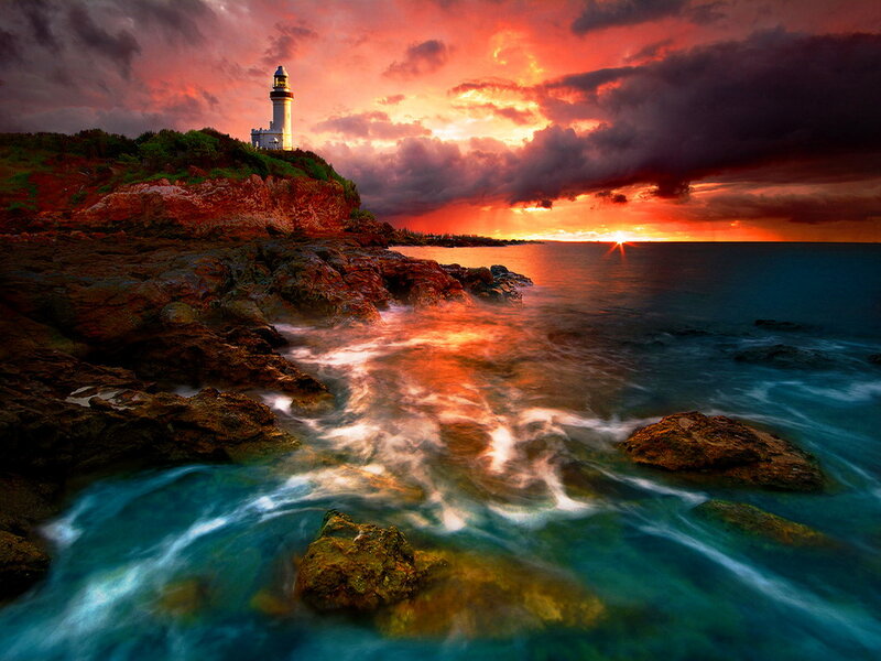 Lighthouse on Rocky Coast — Red