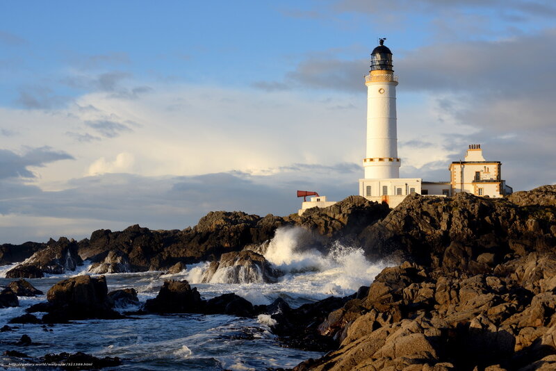 Lighthouse on Rocky Coast — White, Dramatic, Sunset, Photograph