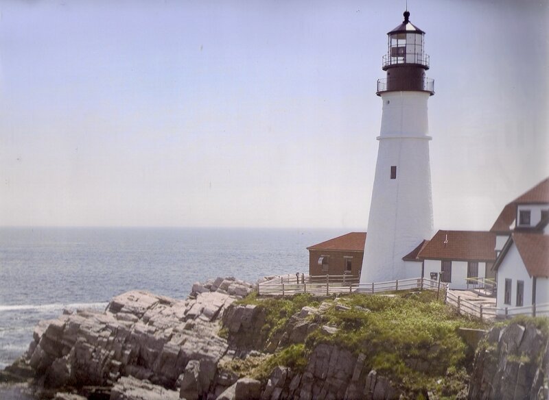 Lighthouse on Rocky Coast — White, Serene, Afternoon, Photograph, Ocean