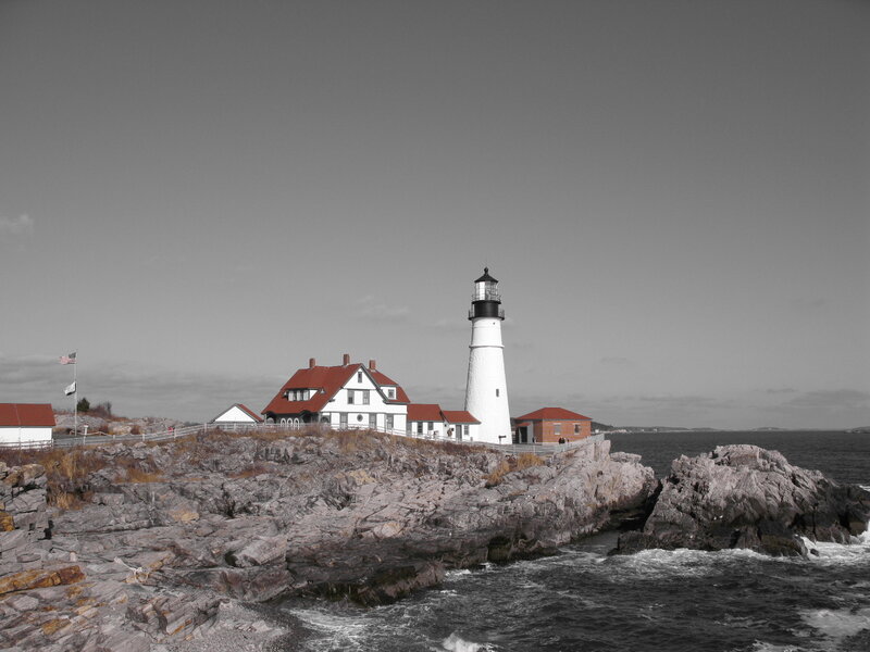 Lighthouse on Rocky Coast — White