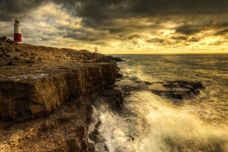 Lighthouse on Rocky Coast — Yellow, Dramatic
