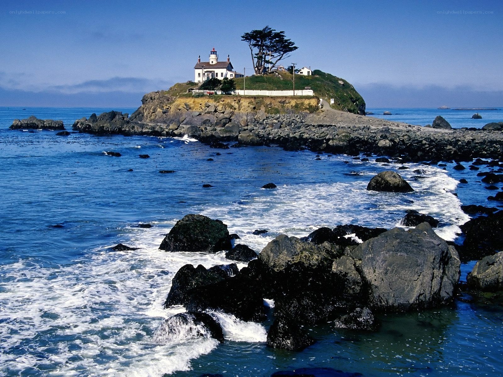 Lighthouse on rocky island