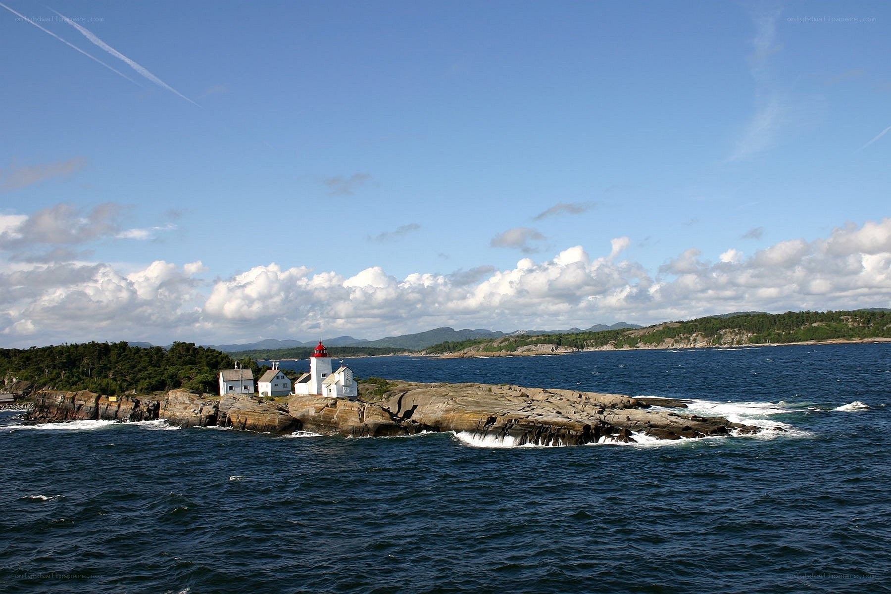 Lighthouse on rocky island