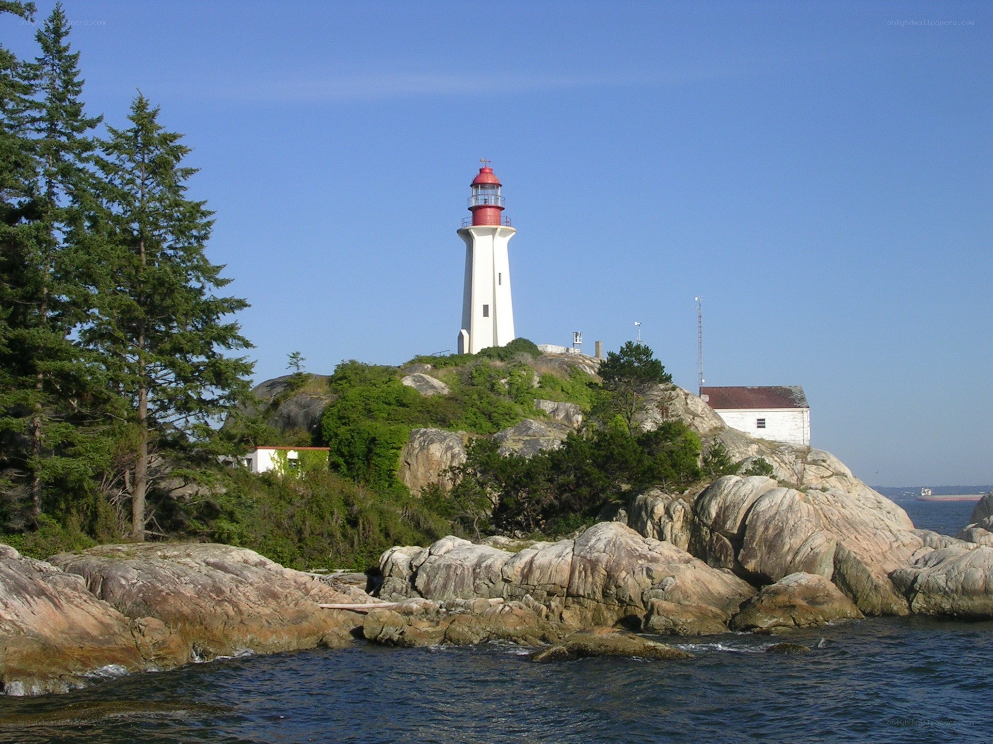 lighthouse on rocky island