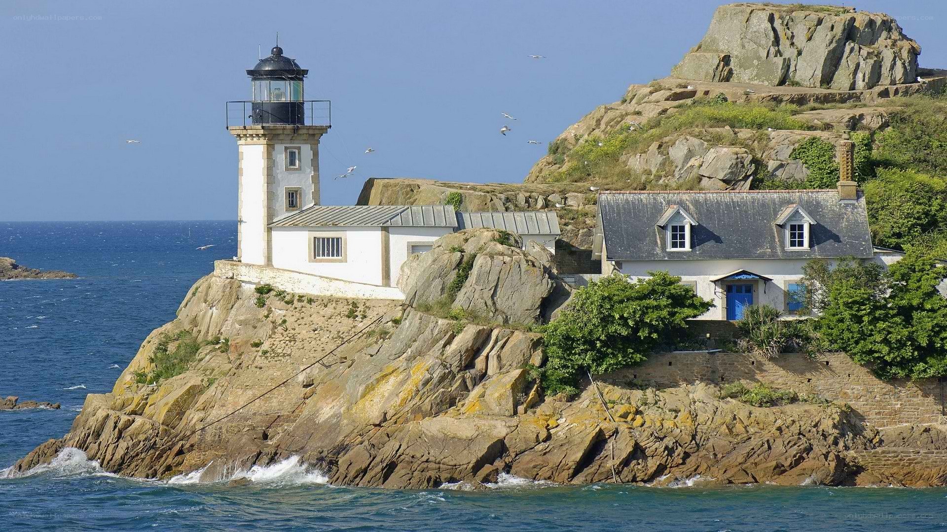 lighthouse on rocky island