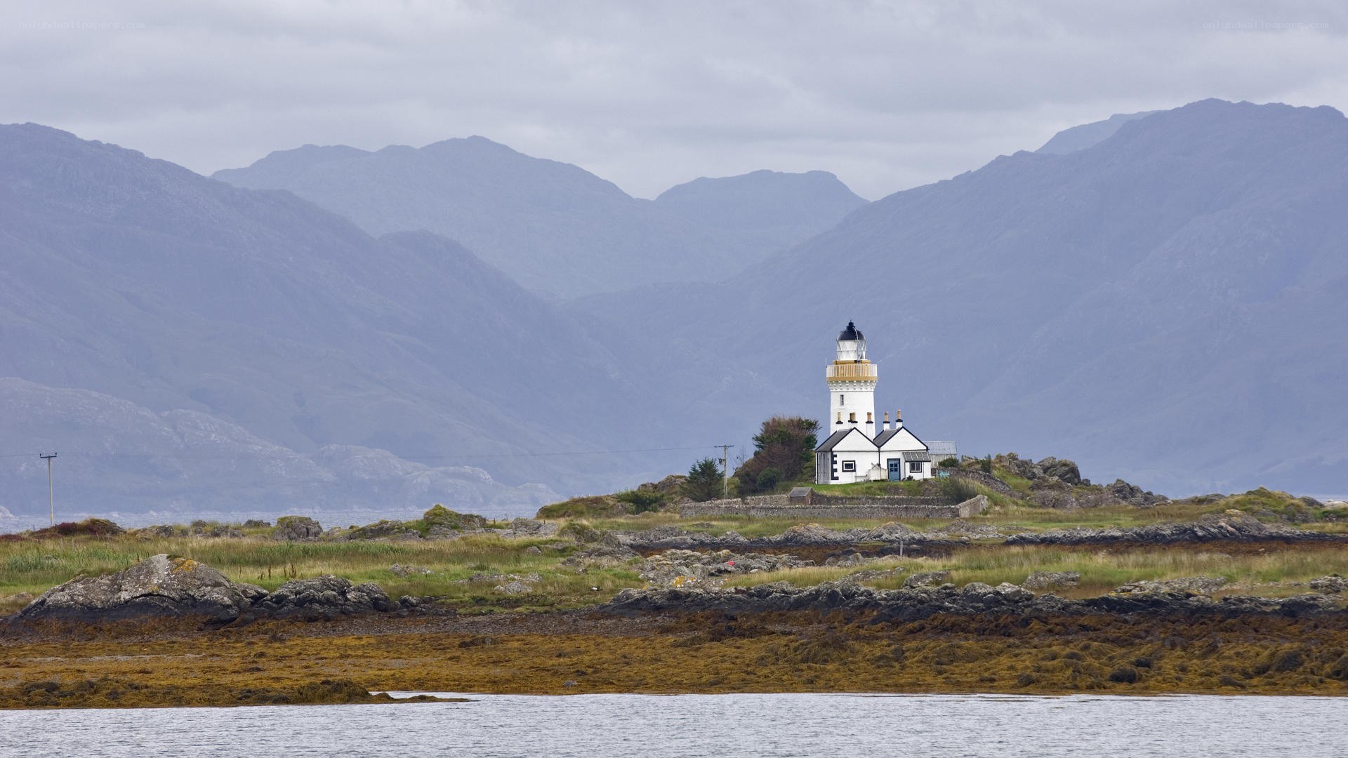 lighthouse on rocky island